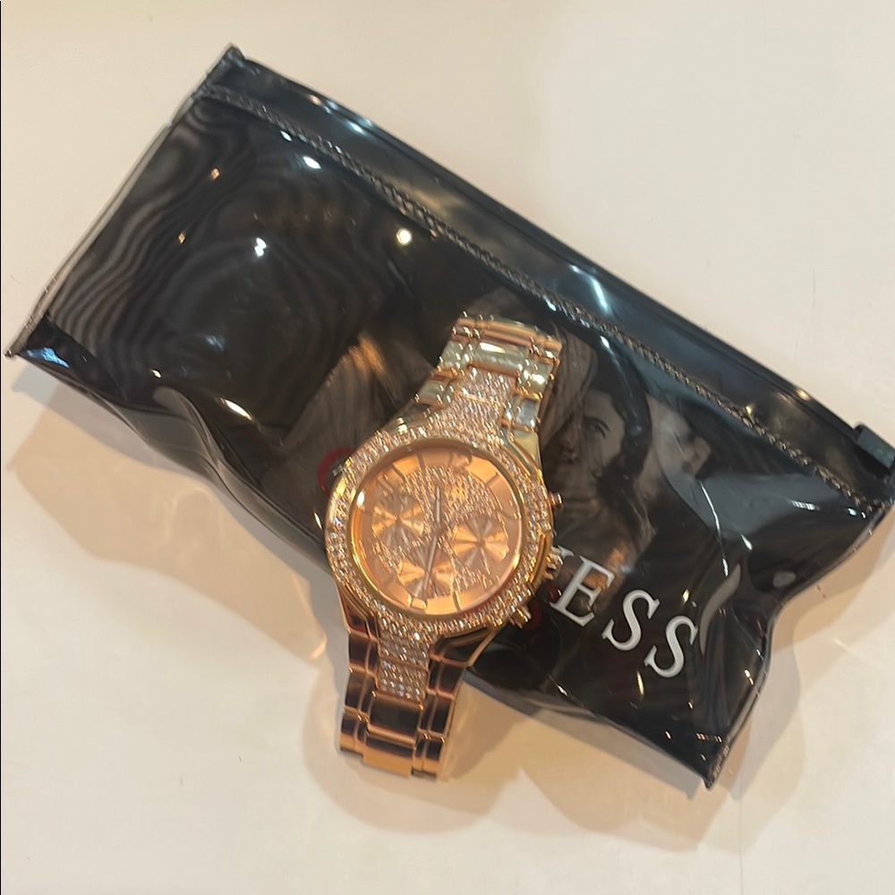 Guess Rose Gold Watch with Zipper Closure and Transparent Design